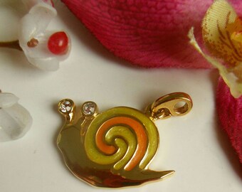 pretty gold tone snail pendant