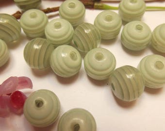 set of 18 green plastic beads