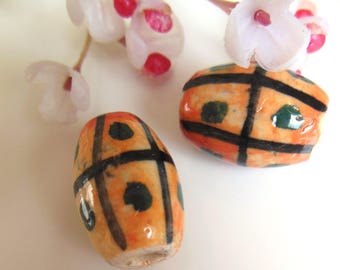 set of 2 olive green and orange ceramic beads