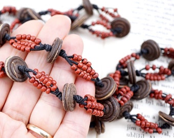 ON VACATION vintage 70s Long Necklace Coconut Disk Beads 3 Knotted Cord String Rusty Red Brown Glass Bohemian boho hippie jewelry