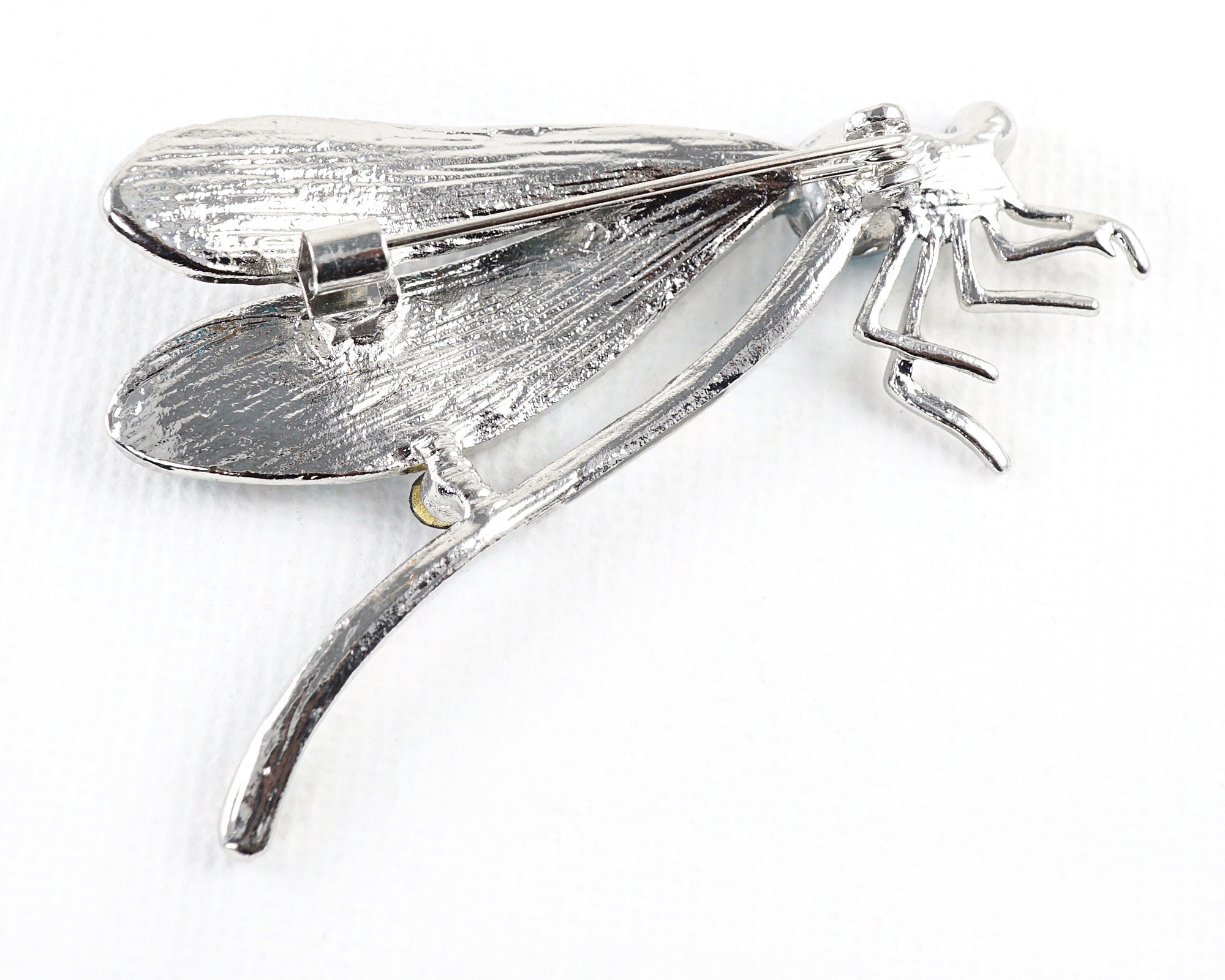 ON VACATION ヴィンテージトンボブローチ、ブルーラインストーン