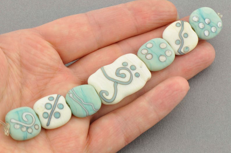 Green and ivory lampwork set