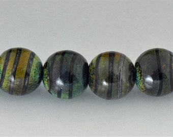 Round raku (iris orange) and black glass lampwork beads