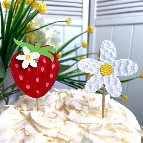 Strawberry and Daisy Cupcake Toppers. Sold in sets of 6, 12 & 24. Make your cupcakes berry sweet and cheerful! Strawberry and daisy picks.