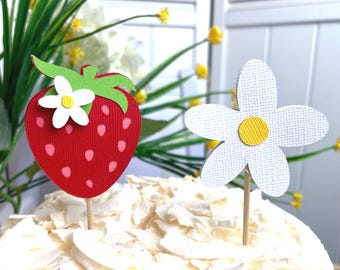 Strawberry and Daisy Cupcake Toppers. Sold in sets of 6 and 12. Make your cupcakes berry sweet and cheerful! Strawberry and daisy picks.