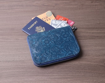 Embossed blue Leather Passport Bag  with Multiple Card Slots, Secure Zipper, and AirTag Slot for commercial affairs and Travelers. 1BYHZ04