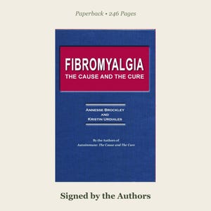 May include: A blue paperback book titled Fibromyalgia: The Cause and The Cure by Annesse Brockley and Kristin Urdiales. The cover features a red rectangular box with white text, 246 pages, and is signed by the authors.
