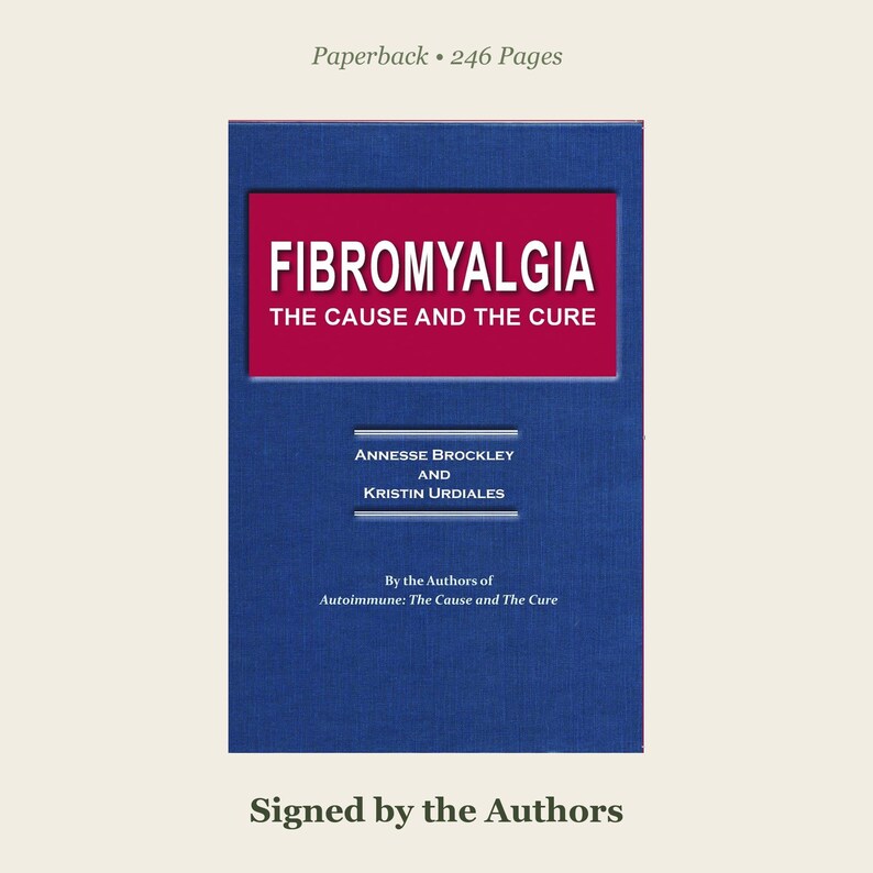 May include: A blue paperback book titled Fibromyalgia: The Cause and The Cure by Annesse Brockley and Kristin Urdiales. The cover features a red rectangular box with white text, 246 pages, and is signed by the authors.
