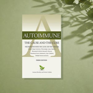 May include: A book titled Autoimmune: The Cause and The Cure, Third Edition, by Annesse Brockley and Kristin Urdiales. The cover features a large letter A, a green horizontal band, a small green plant icon, and a list of medical conditions.