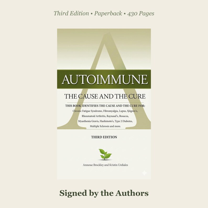 May include: A paperback book titled Autoimmune: The Cause and the Cure, Third Edition, 430 pages. The cover features a large letter A, a green horizontal bar, and a small green leaf icon. It lists various conditions and is signed by the authors.