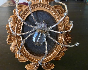 Sparkly spider in mini vintage style frame