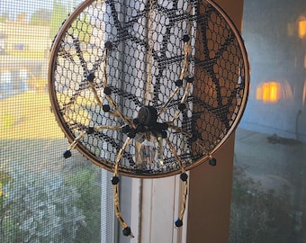 Spider suncatcher with lace web