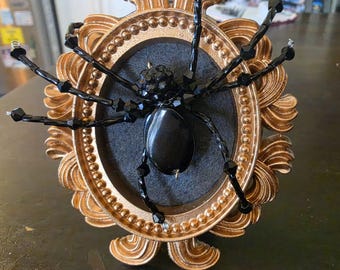 Sparkly spider in mini vintage style frame