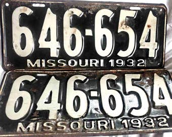 Matched pair or 2 car license plates original 1932 646-654 never issued showing aging and storage.