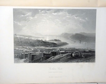 May include: Black and white lithograph print of the Golden Gate from Telegraph Hill. The print depicts a detailed cityscape with buildings, hills, and a bay with ships. The title "Golden Gate" is visible, along with the publisher's information.