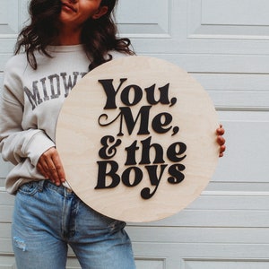 You, Me, and the boys 18 inch round | Interior Trends | Living room wall art