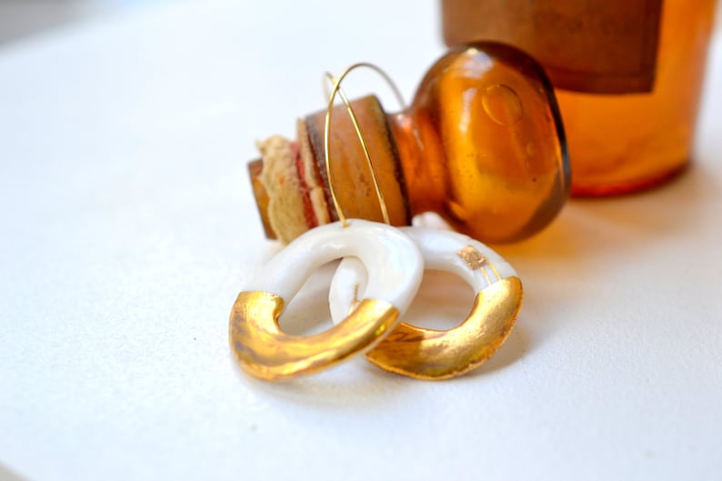 glazed .Porcelain jewelry porcelain and gold earrings Emba