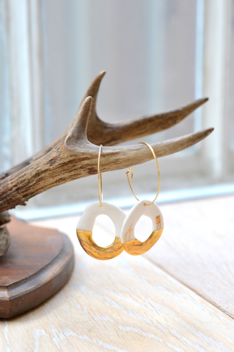 glazed .Porcelain jewelry porcelain and gold earrings Emba