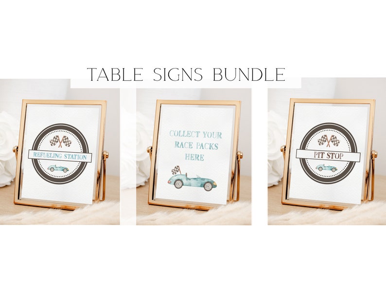 May include: Three gold-framed table signs with a racing car theme. The signs read "Refueling Station", "Collect Your Race Packs Here", and "Pit Stop".