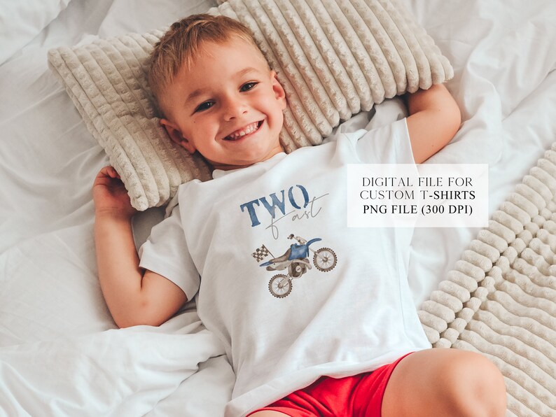 May include: A white t-shirt with a blue and white illustration of a dirt bike and the text "TWO fast".