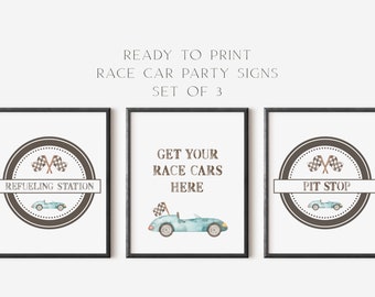 May include: Three printable signs for a race car themed party. The signs feature a brown circle with a checkered flag and a cartoon race car. The text on the signs reads "Refueling Station", "Get Your Race Cars Here", and "Pit Stop".