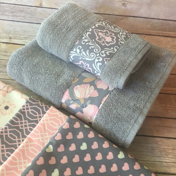 pink and grey towels