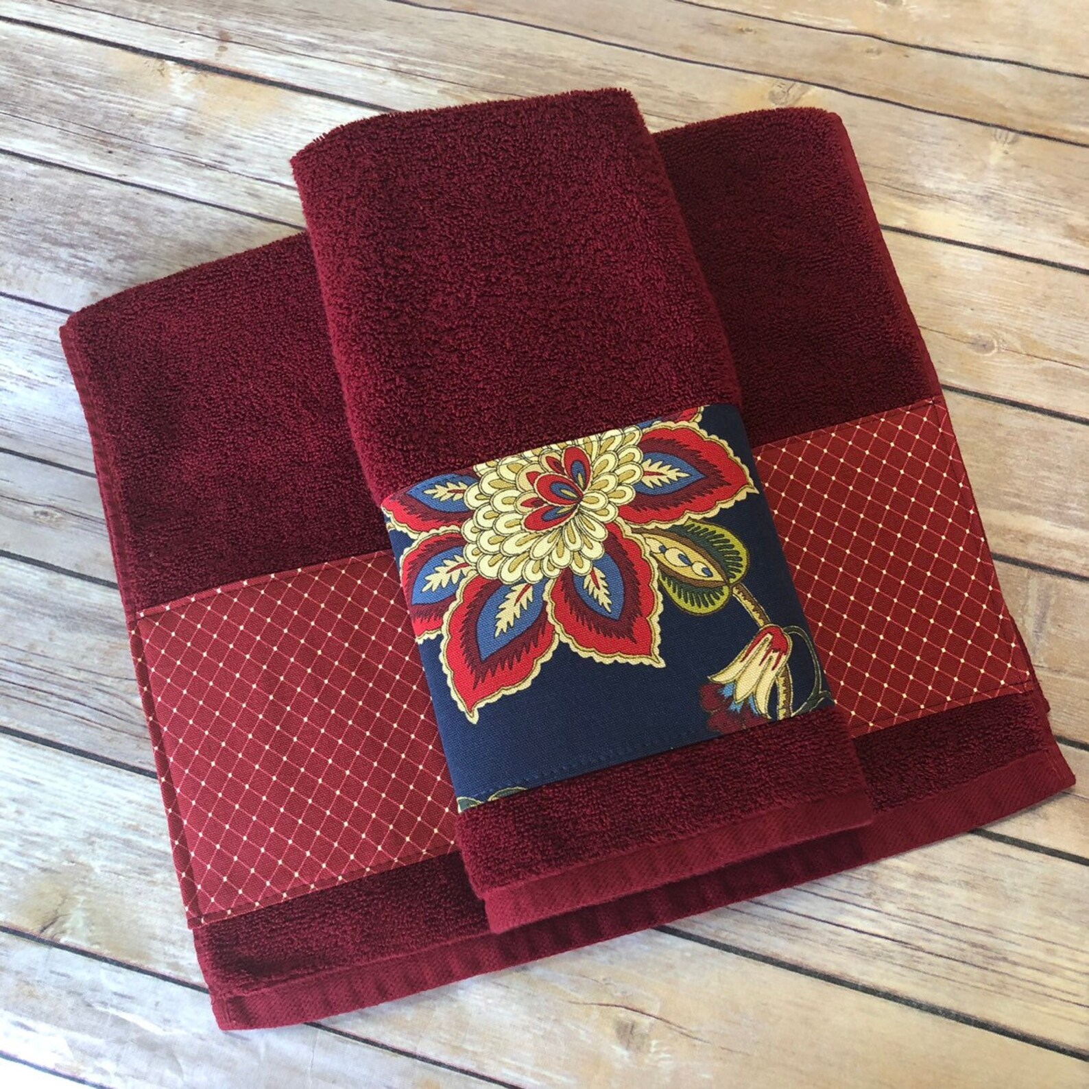 red patterned bath towels