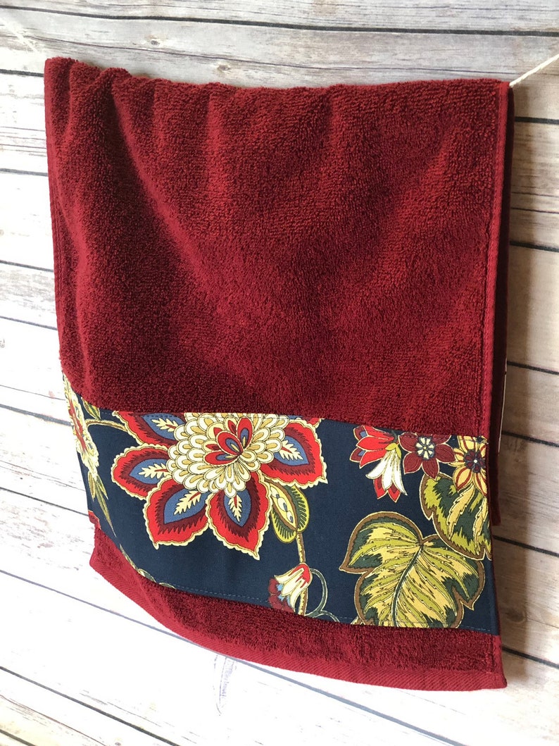 red patterned bath towels
