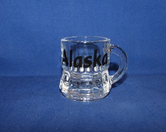 not quite level Last Few ! Alaska Shotglass Tipsy Moose Saloon shot glass 