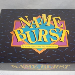May include: A box for the board game "Name Burst" with a colorful design and the text "The Memory-Jogging, Name-Calling, Who's Who Game!" on the front.