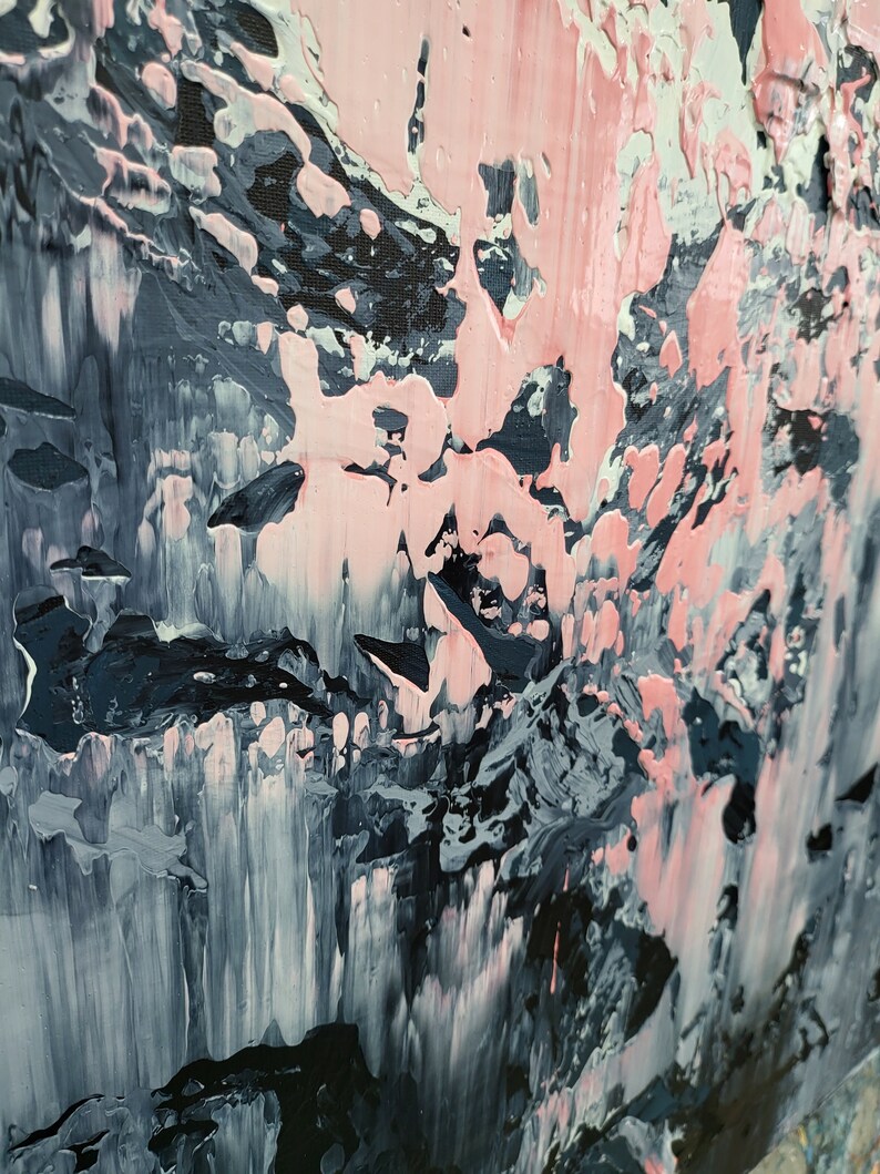 May include: Abstract painting with a mix of black, white, and pink paint. The paint is applied in thick layers, creating a textured surface.