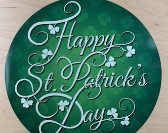 May include: A green circle with a white background and a white shamrock pattern. The text "Happy St. Patrick's Day" is written in a white cursive font.