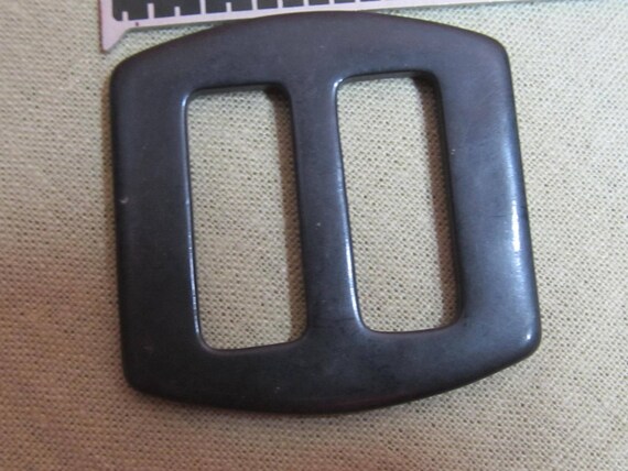 Celluloid or early plastic black belt buckle; sas… - image 4