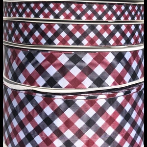 May include: A stack of red, black, and white gingham ribbon. The ribbon is in a checkered pattern. The text "the Ribbon Fanatic" is at the bottom of the image.