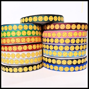 May include: A collection of colorful ribbon rolls with a softball pattern. The ribbon is 1.5 inches wide and is perfect for crafting, decorating, and adding a sporty touch to your projects.