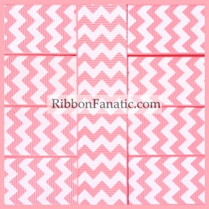 May include: Pink and white chevron patterned ribbon. The ribbon is cut into 9 squares.