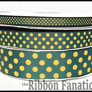 May include: Spools of ribbon in various widths, featuring a dark green background with yellow polka dots. The top ribbon has small dots, while the others have larger, evenly spaced dots. The Ribbon Fanatic logo is visible at the bottom.