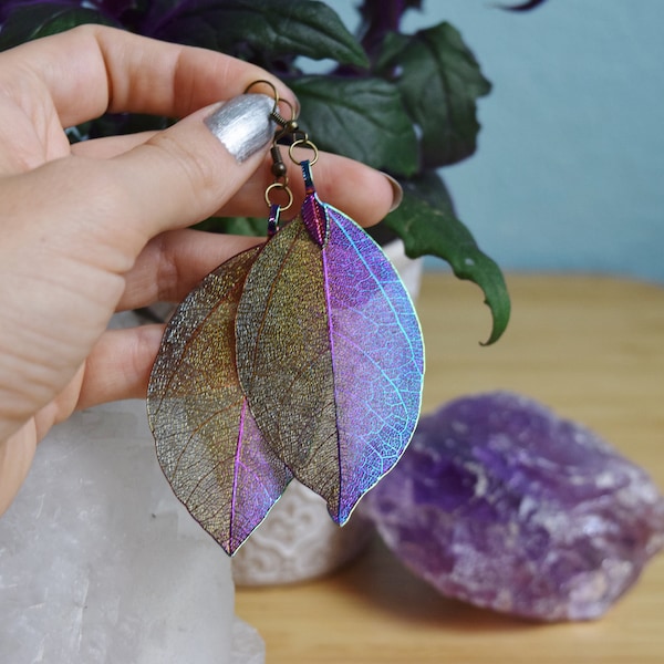 color changing leaf skeleton earrings ; metallic rainbow metal coated real leaves ; unique witchy jewelry / gifts for hippies teens & ladies