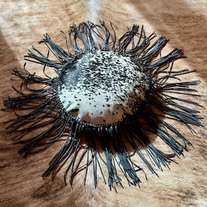 Round Black & White Cowhide Pillow with Fringe