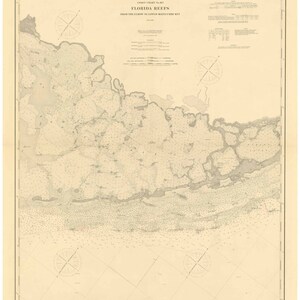 May include: A vintage nautical chart of Florida Reefs from the Elbow to Lower Matecumbe Key. The chart is printed on cream-colored paper and features detailed markings of the reefs, shoals, and other navigational hazards.