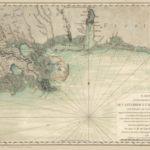 May include: An antique map of the coast of Florida and Louisiana, showing the course of the Mississippi River. The map is printed on aged paper and features a compass rose in the center. The title of the map is "Carte d'une partie des côtes de la Floride et de la Louisiane, contenant le cours du Mississipi."