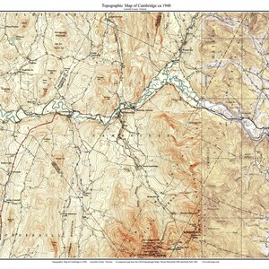 May include: A topographic map of Cambridge, Vermont, circa 1948. The map shows the area's terrain with contour lines, rivers, and roads. The title "Topographic Map of Cambridge ca 1948" is at the top of the map.