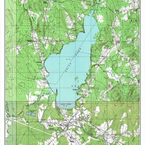 May include: A topographic map of Unity Pond, Maine, from 1982. The map shows the pond, surrounding roads, and elevation contours. The map is in green, blue, and brown.