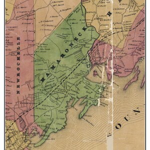 May include: An antique map of Mamaroneck, New York, from 1858. The map shows the town's streets, roads, and waterways. The map is in a vintage style, with hand-drawn lines and lettering. The map is printed on paper and has a yellowed color.