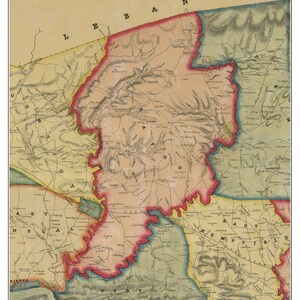 May include: An antique map of Rapho Township, Pennsylvania, from 1851. The map shows the township's boundaries, roads, and waterways. The map is printed in shades of brown, green, and blue.