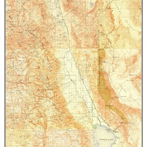 May include: A vintage topographical map of Owens Valley, California, circa 1913. The map shows the Owens River, Owens Lake, and surrounding mountains. The map is in shades of brown, yellow, and green.