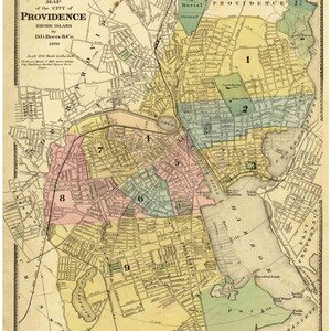 May include: An 1870 map of Providence, Rhode Island, showing the city's streets and neighborhoods. The map is divided into nine sections, each with a different color. The map also includes a key that identifies the different sections of the city.