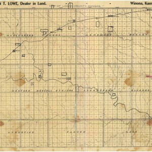May include: A vintage map of Logan County, Kansas, showing the location of towns and townships. The map is printed on a yellowed paper and has a grid pattern. The text "JOHN T. LOWE, Dealer in Land. Winona, Kansas." is printed at the top of the map.