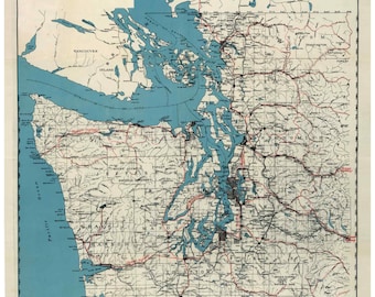 May include: A vintage map of Puget Sound Country from 1919, showing the region's geography, including the Puget Sound, the Olympic Mountains, and the Cascade Range. The map also shows major cities, towns, and roads.