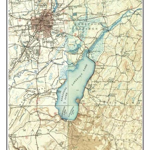 May include: A vintage map of Saratoga Lake from 1949, featuring the lake and surrounding areas. The map includes the text "Saratoga Lake 1949" at the top and other place names. The map is a composite from old USGS maps.